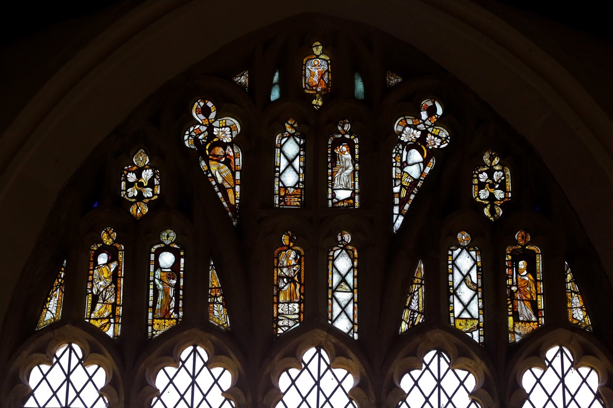 Window depicting the Tracery Lights with God, the Trinity, St Peter, St Paul, St Catherine and Gabriel, and a Bird by English School