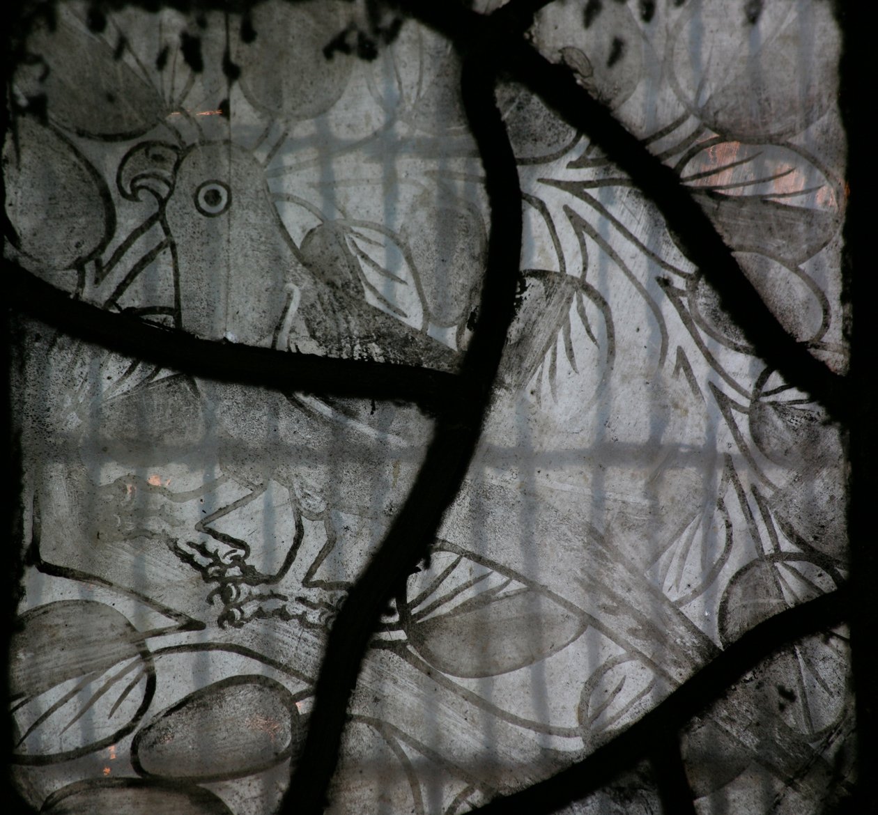 Window NW depicting a bird by English School