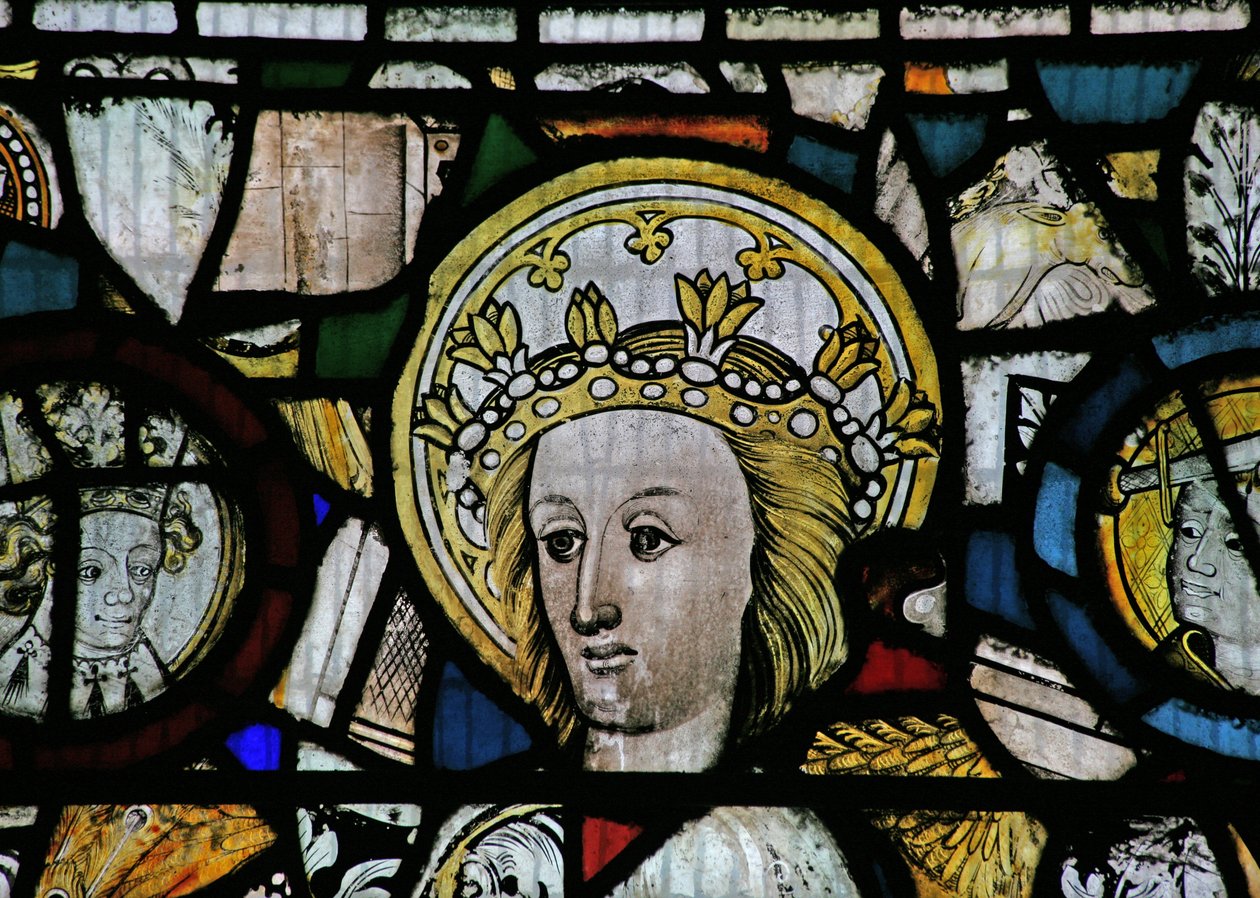 Window NW depicting a female head, crowned and sainted by English School