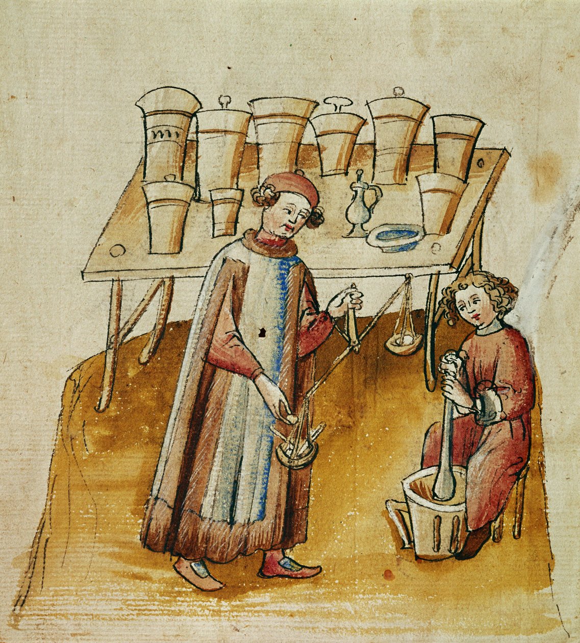 A pharmacist and his assistant pound herbs and roots for medical use, c.1380-1400 by Erich Lessing