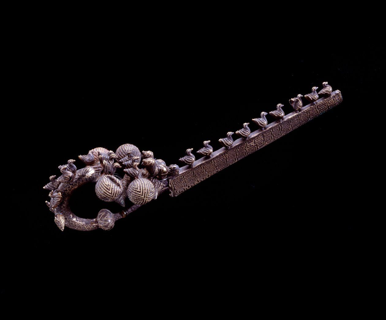 Etruscan civilization: silver dragon fibula from the necropolis of Banditella, Marsigliana d