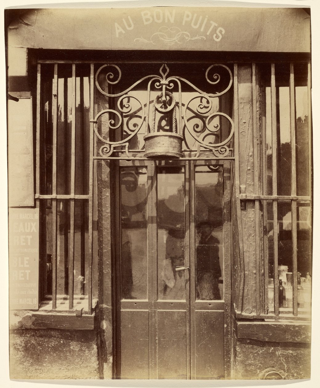 At the Good Well, Michel Le Conte Street, 36 (IIIe) by Eugène Atget