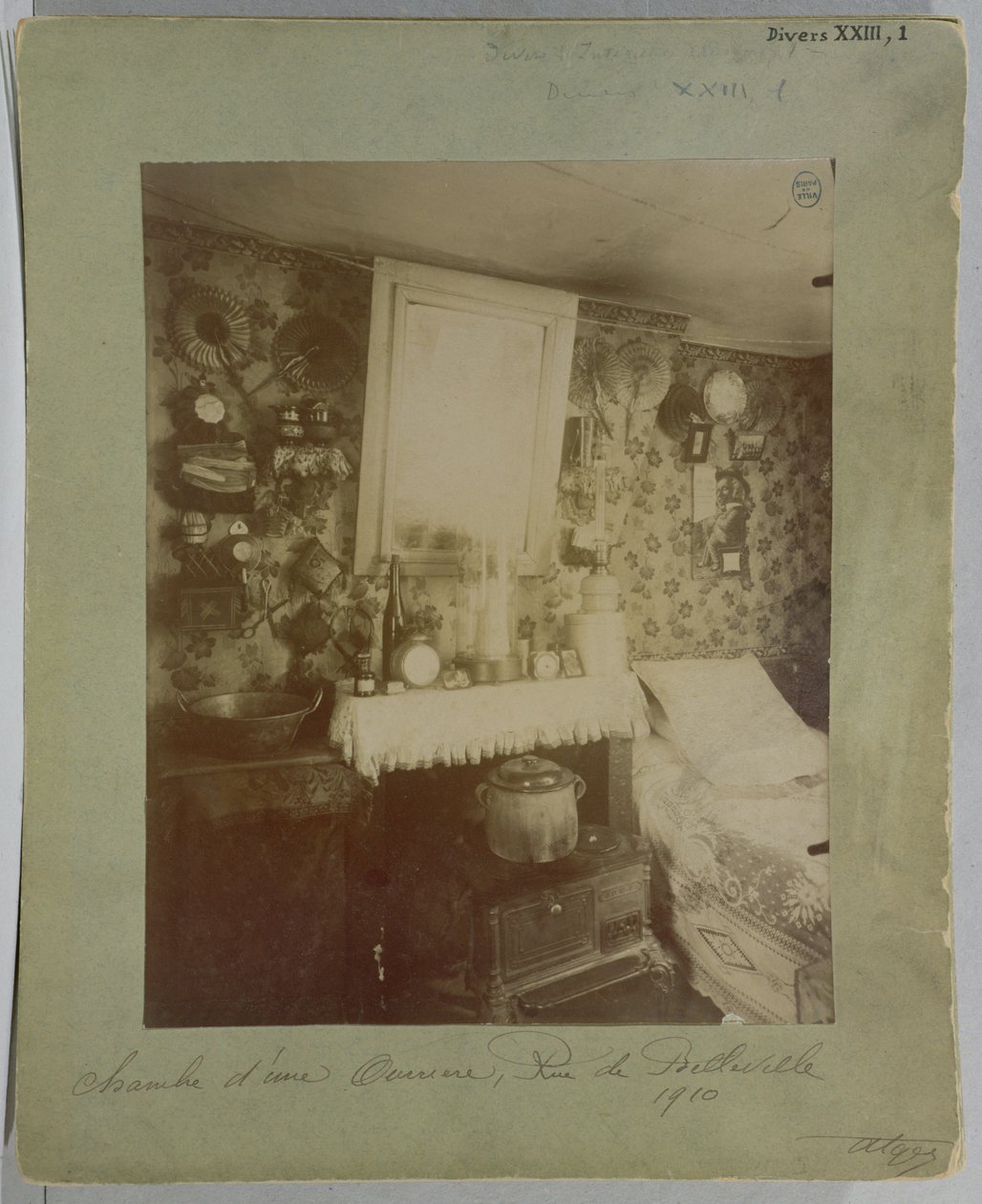 Bedroom of a female worker, rue de Belleville, Paris, 1910 by Eugène Atget
