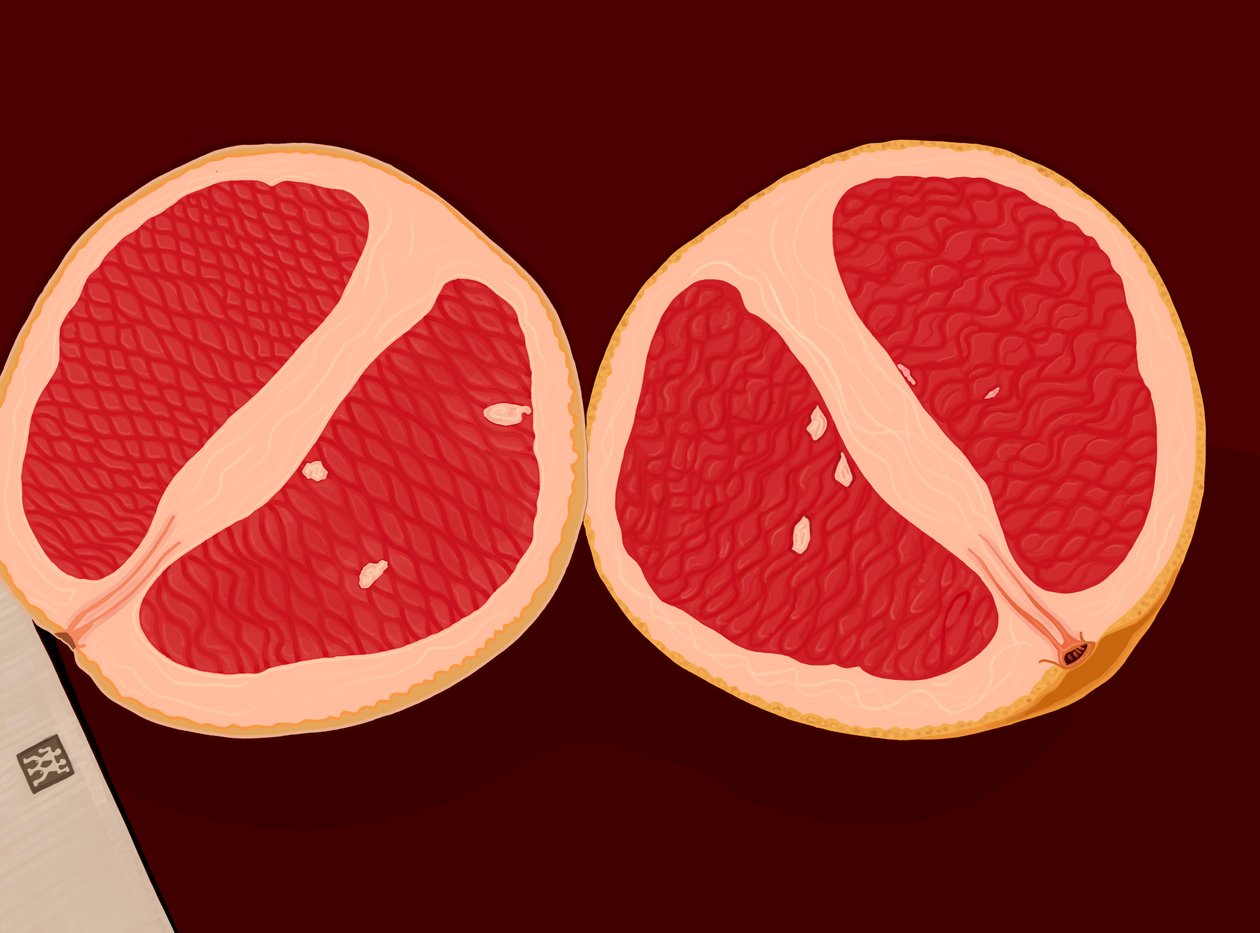 Grapefruit Sliced In Half by Evan Sklar