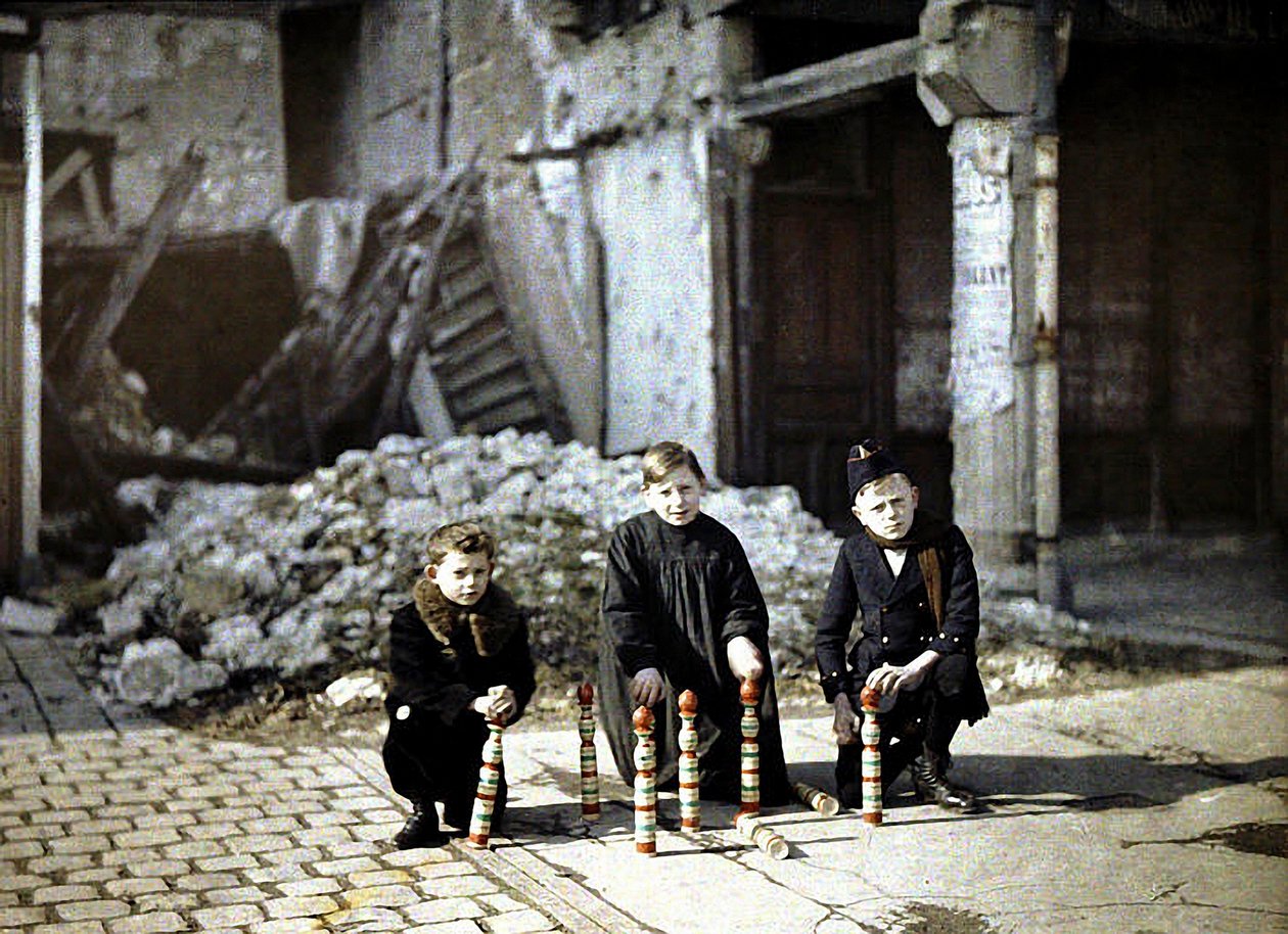 Three Children Playing with Bowling Pins at the Place Drouet d