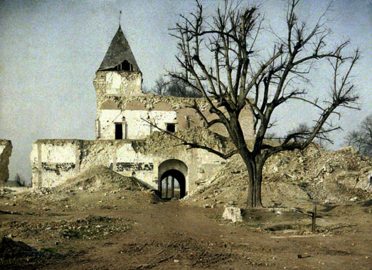 Heavily damaged castle, and the tree where Napoleon III once rested, Ham, Somme, France, 1917 by Fernand Cuville