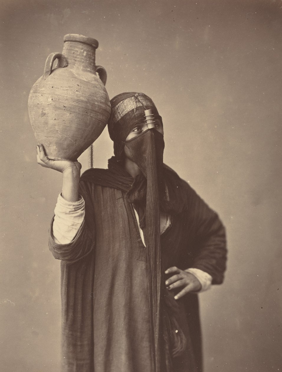 Water Carrier in Cairo by Félix Bonfils