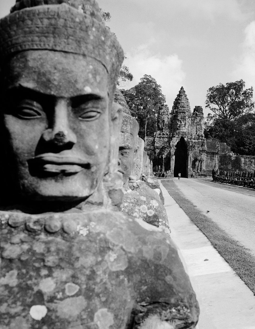 Statue on the Street of Access in Angkor Thom, Cambodia by Fosco Maraini