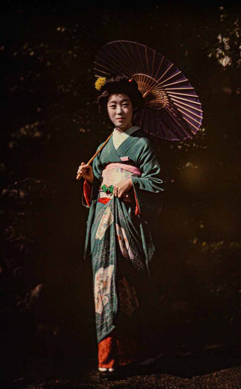 Japanese woman holding parasol and wearing kimono, early color autochrome, circa 1916 by Franklin Price Knott