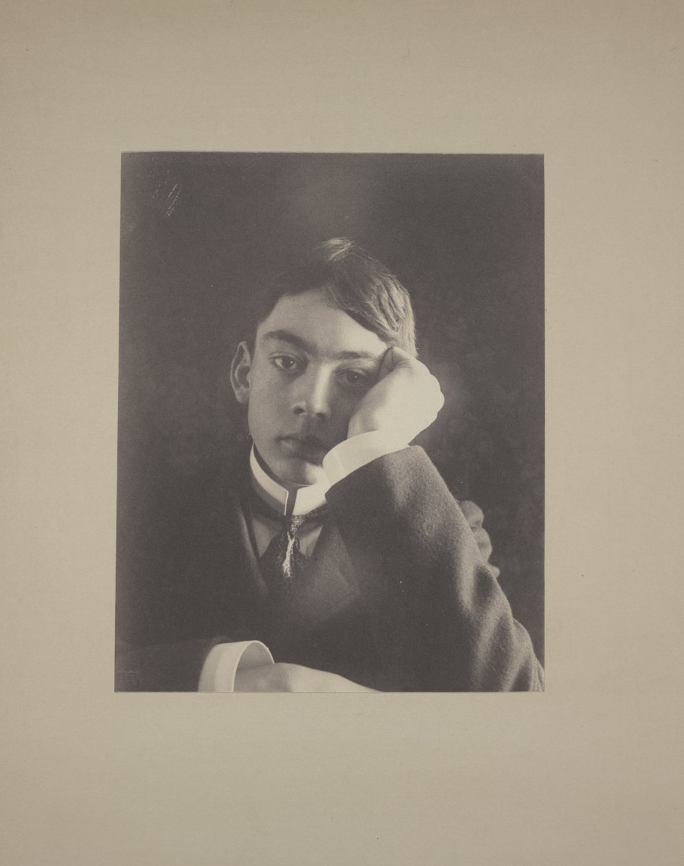 Boy in Suit with Hand Against Face by Frederick Holland Day