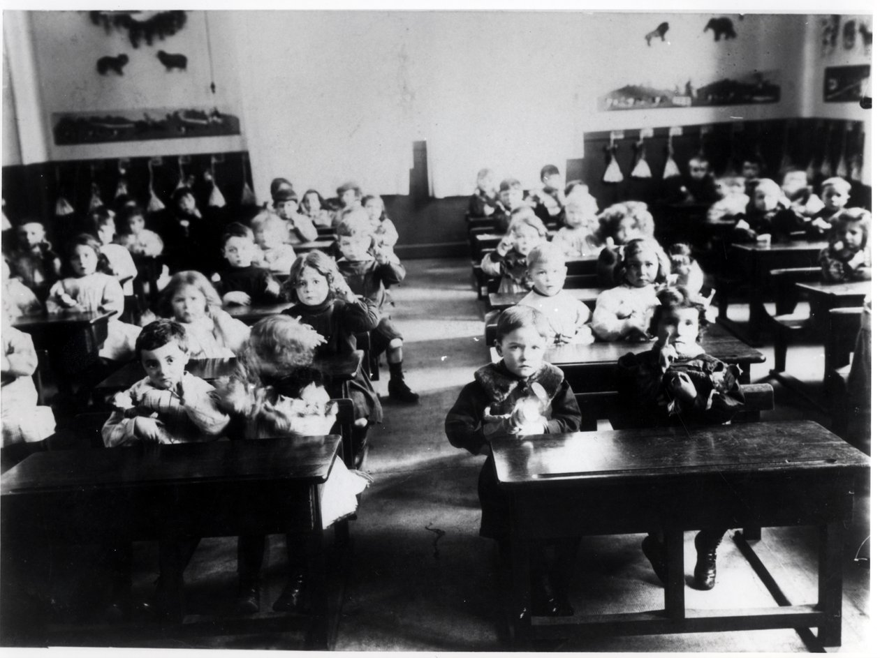 Children in a classroom by French Photographer