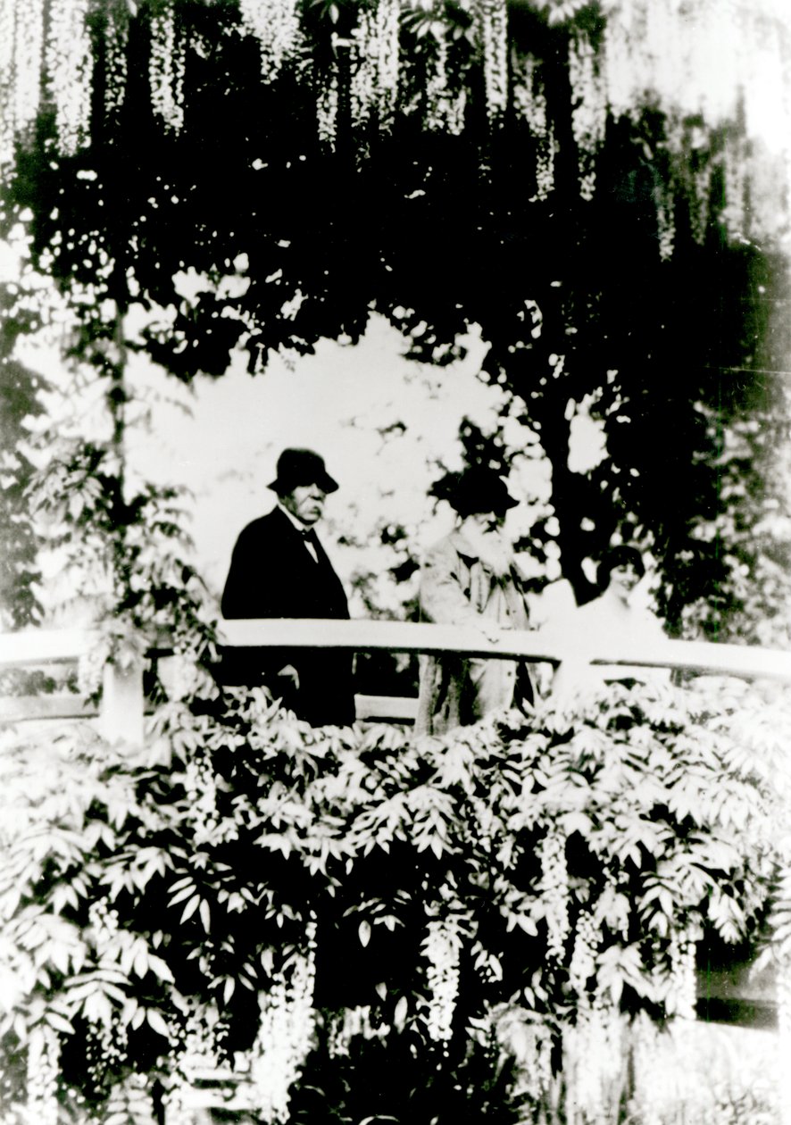 Georges Clemenceau, Claude Monet, and Alice Butler on the Japanese Bridge in Monet