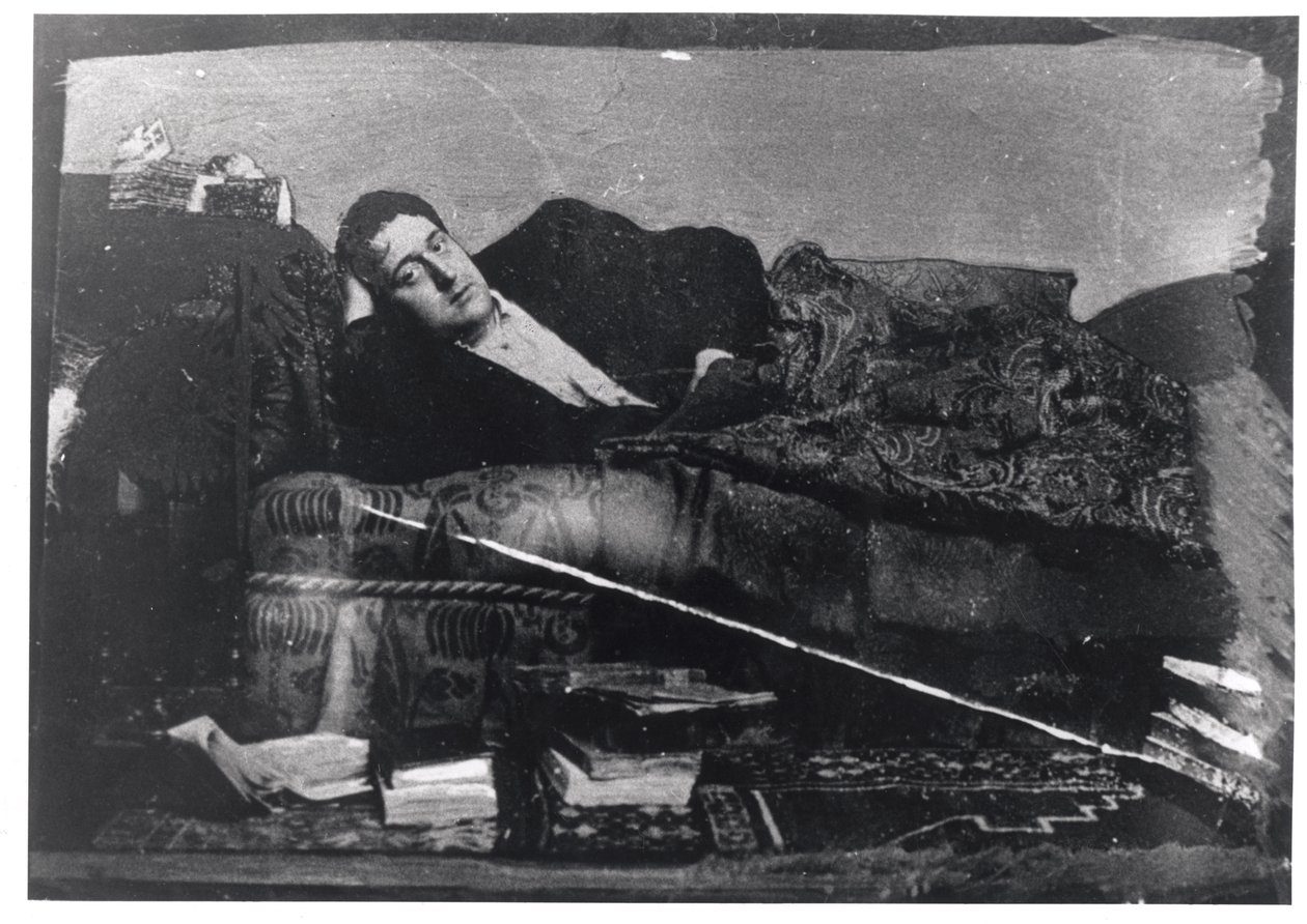 Portrait of Guillaume Apollinaire (1880-1918) reclining, c.1910 by French Photographer