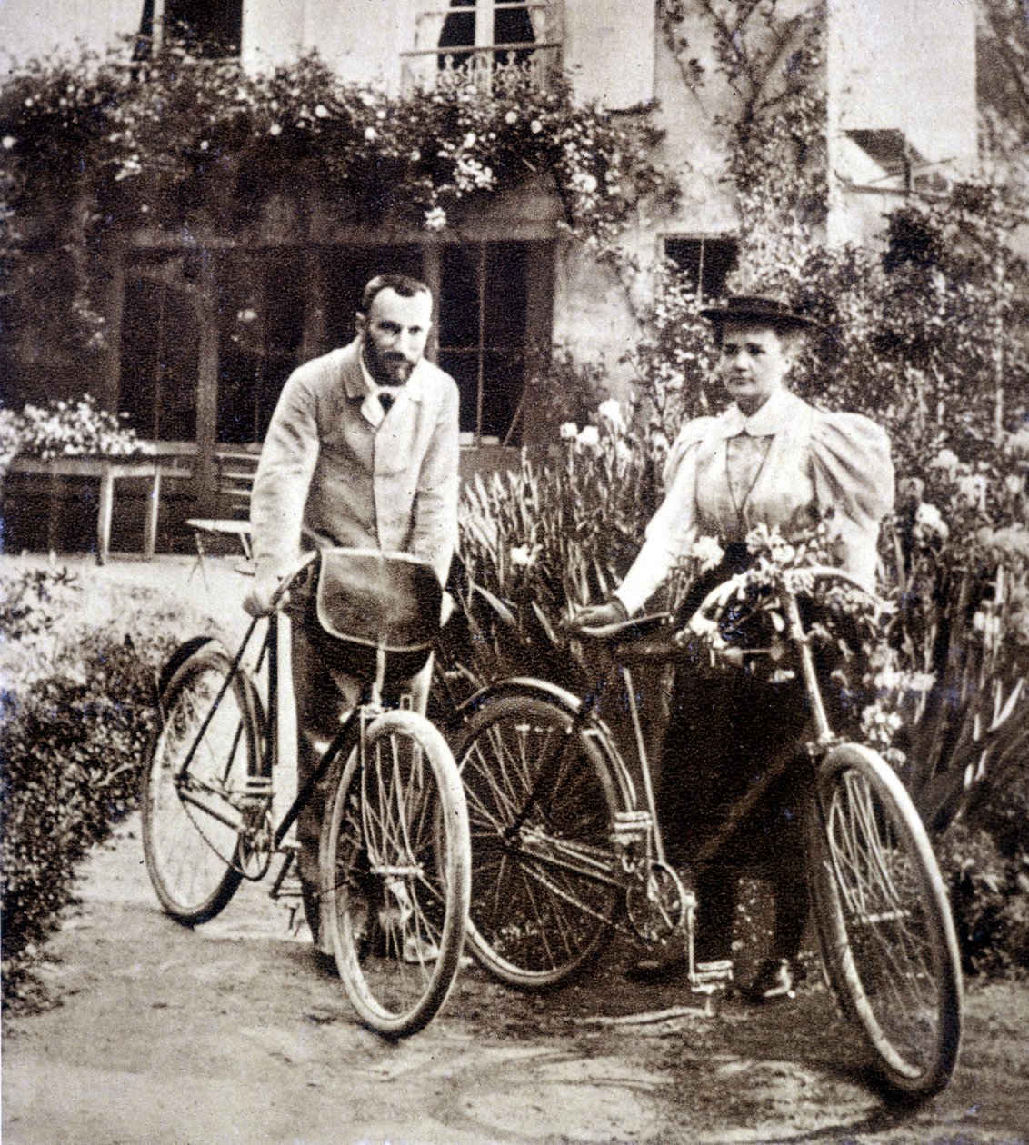 Pierre and Marie Curie in their garden 1895 by French Photographer