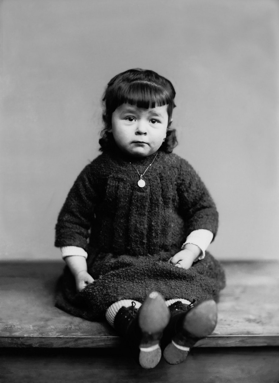 Portrait of a Little Girl from Bourmont in Haute Marne, with Her Baptism Medal. Photography Late 19th Century. Ducos Collection by French Photographer