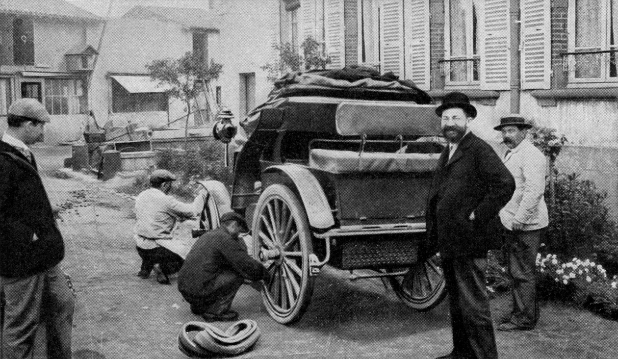 The French industrialist Edouard Michelin equipped with tires one of the first cars by French Photographer