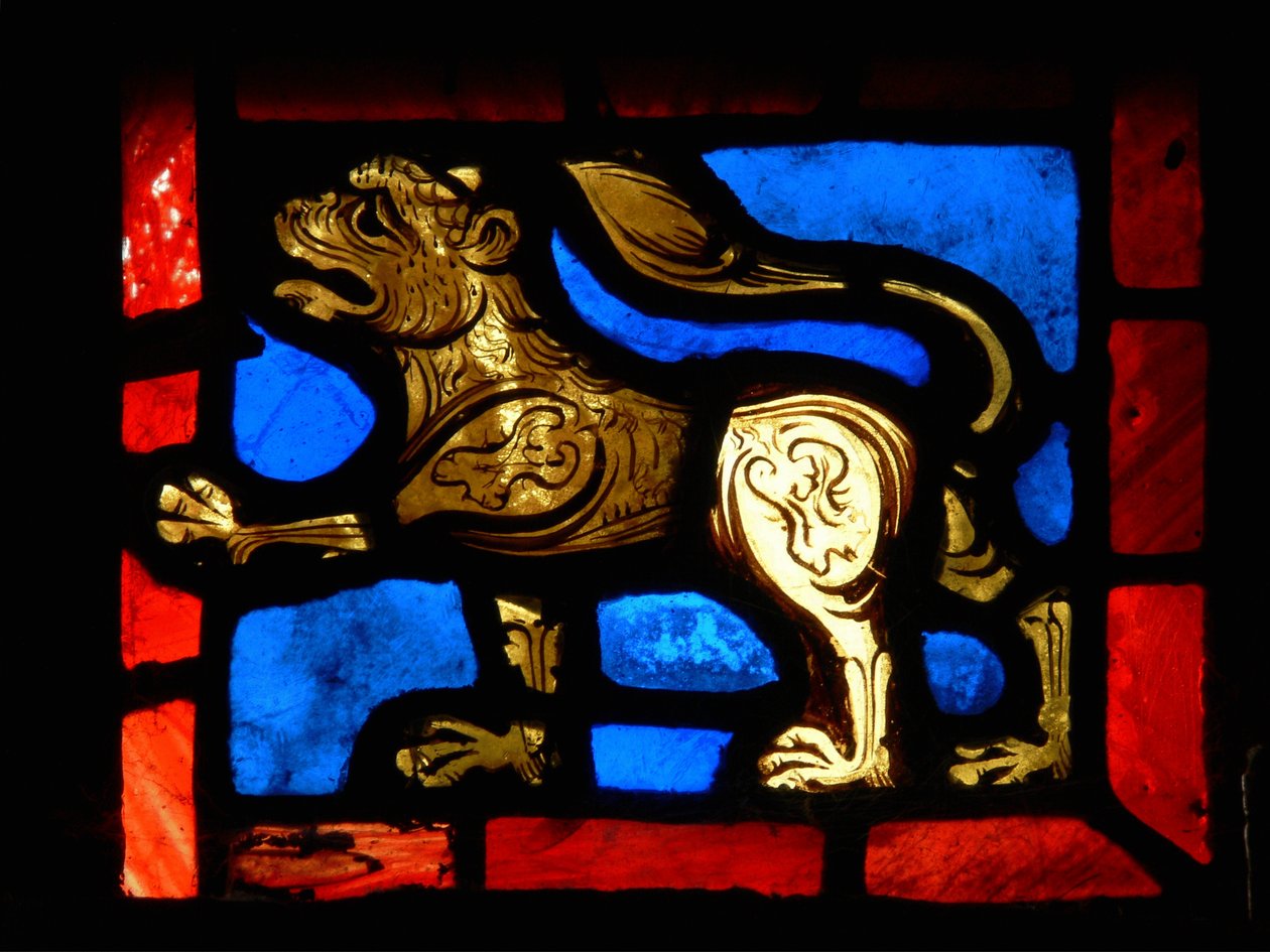 A corner piece depicting a lion, from the Passion window by French School