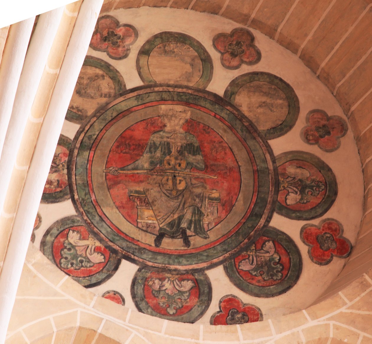A view of a painted rosette in the western-most bay, south side by French School
