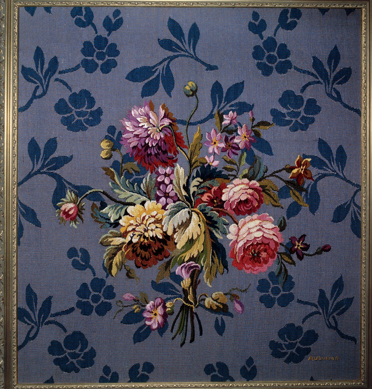 Bouquet of flowers on a blue background. Tapestry of the Aubusson manufactures. 18th century. Aubusson, Tapestry Museum by French School