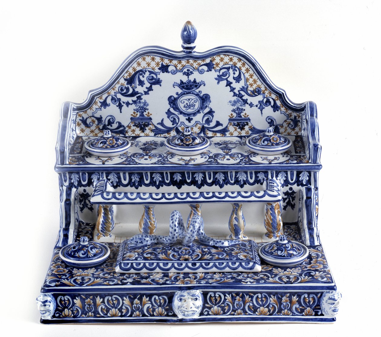 French calligraphy: Writing in porcelain of Gien, with a total length of 40 centimetres, this piece is very representative of the 18th century. There are 5 inkbeds on two stages, as well as a rectangular plumboard. Paris, the pen museum. by French School