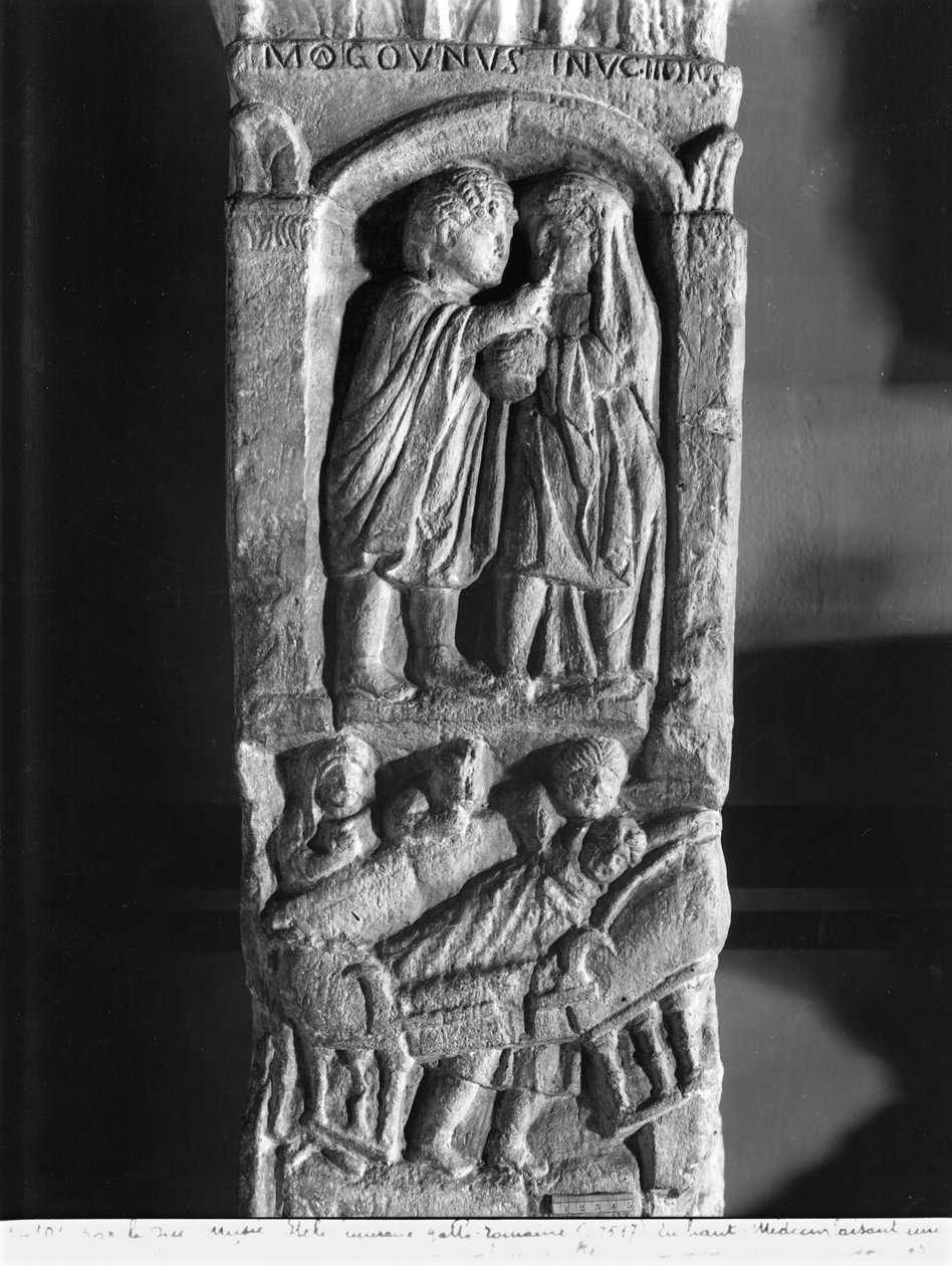 Funerary stela depicting a doctor operating on a woman