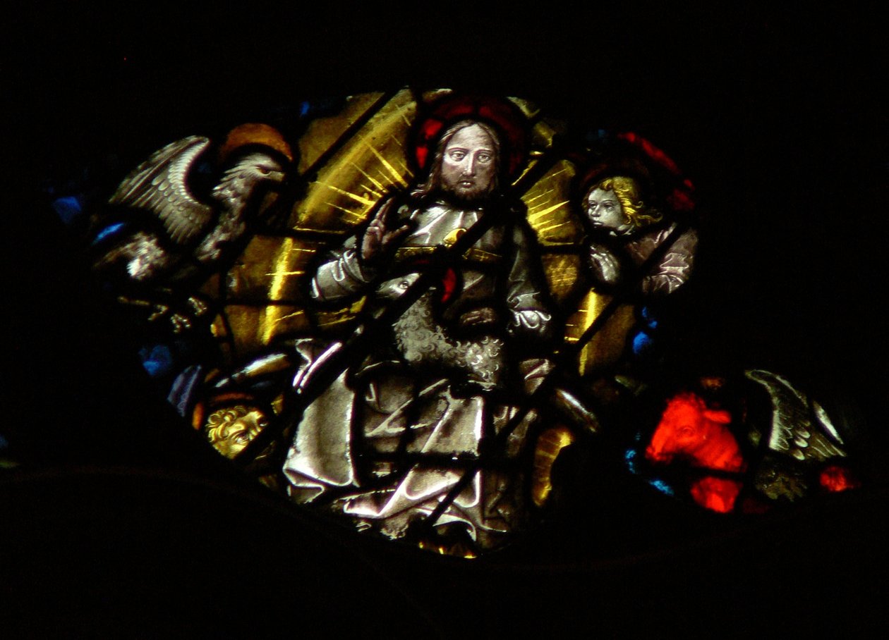The west rose window depicting a scene from the Book of Revelation: Lamb before the throne, between the four sacred living creatures by French School