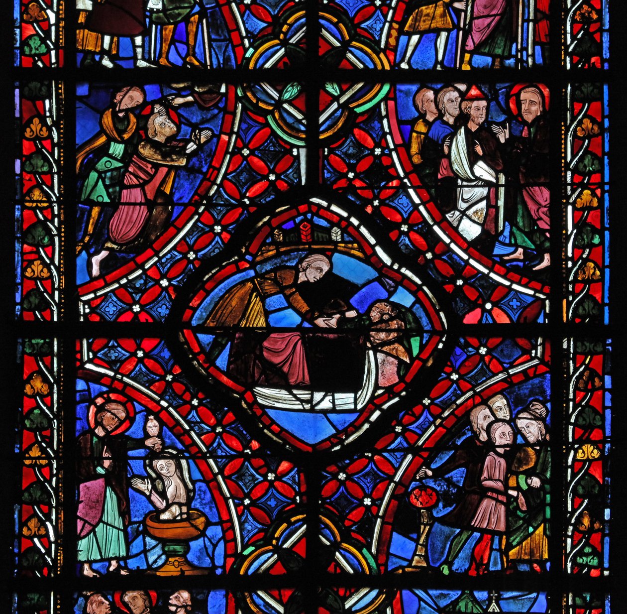 Window depicting the third section of the St James window: not all of the scenes have been identified, but a baptism can be seen and possibly the martyrdom of the saint by French School