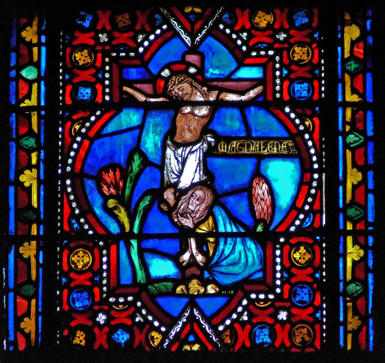Window n1-L depicting a scene from the life of St Mary Magdalene - the saint at the foot of the Cross by French School