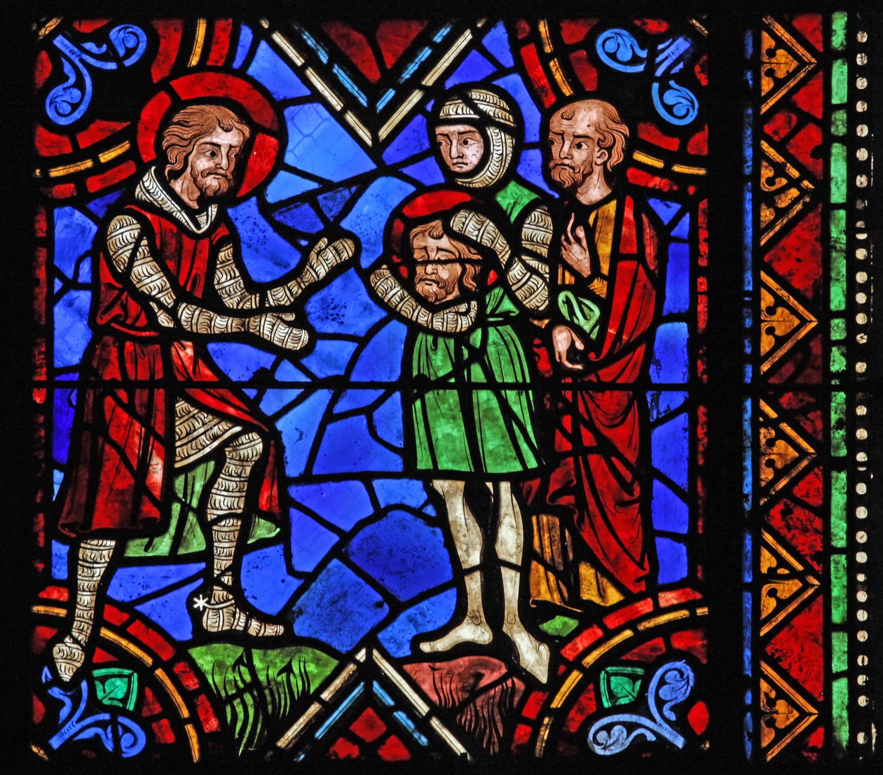 Window depicting St Julian of Brioude story - St Ferreol, a friend of Julien, who died during the Diocletian persecutions, receives Brioude