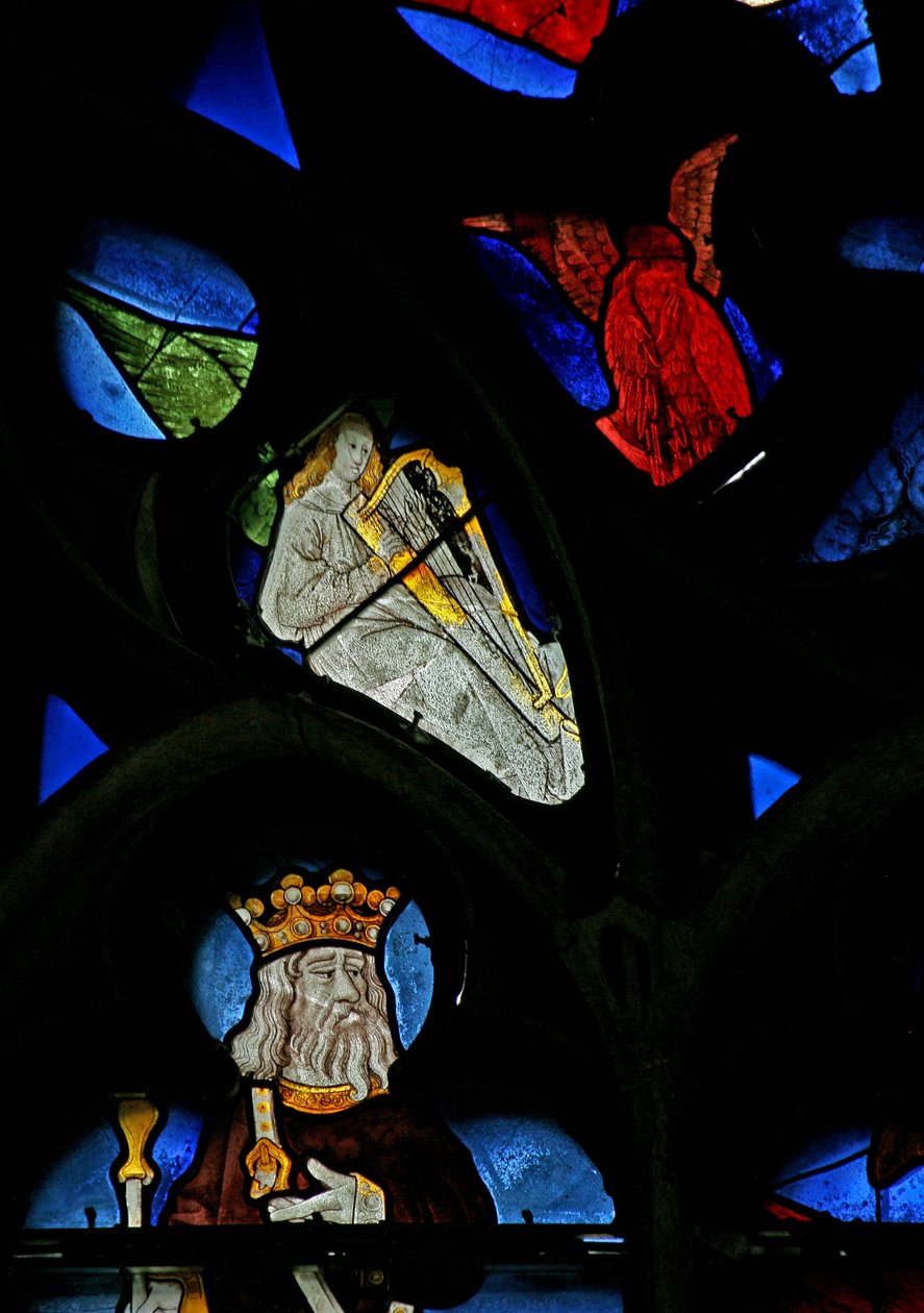 Window depicting a musician angel with a harp by French School