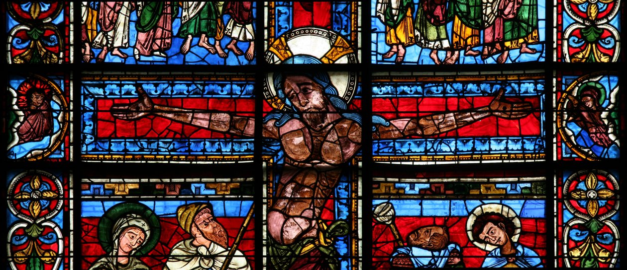 Window depicting the Crucifixion with the sun and moon by French School