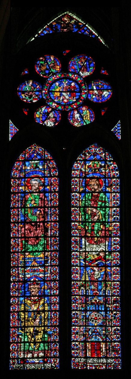 Window w102 depicting St Peter and St Andrew; Soissons Cathedral and a Bishop; in the rose Scenes from the life of St Peter by French School