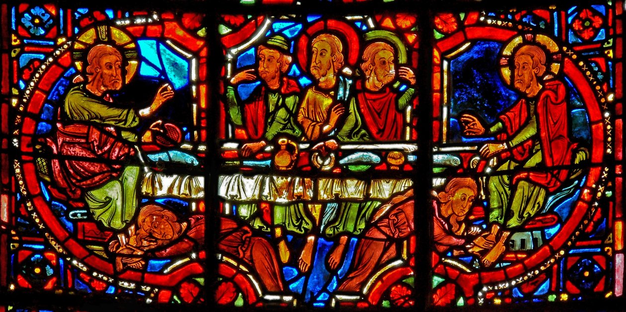 Window w17 depicting a scene from the life of St Mary Magdalene - the saint washing Christ