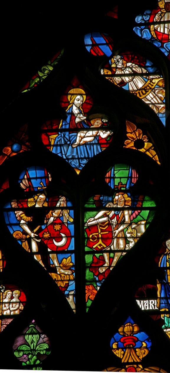 Tracery lights with angels carrying shields of arms by French School