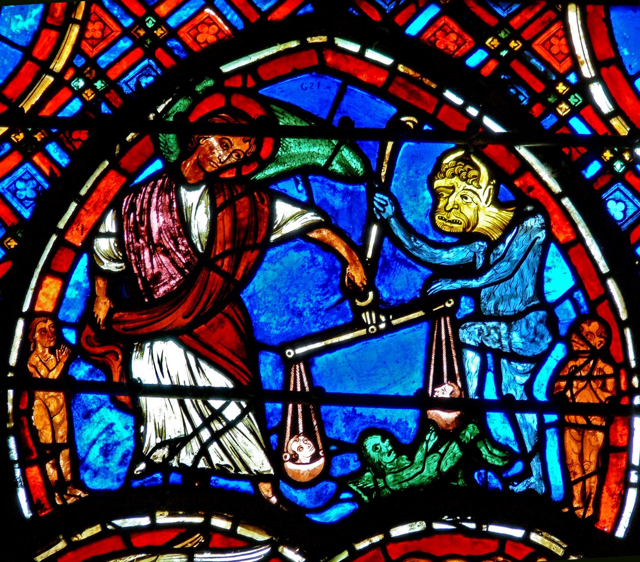 Window depicting a scene from the Last Judgement: St Michael weighing the souls by French School