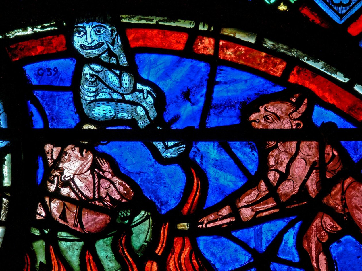Window depicting an impenitent being tormented by demons by French School
