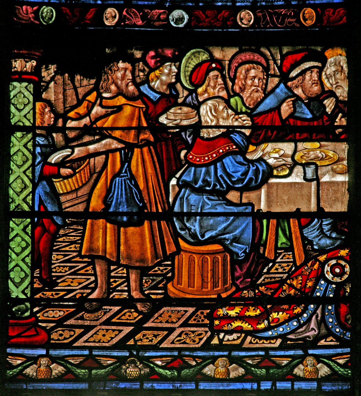 Window depicting the meal at Simon