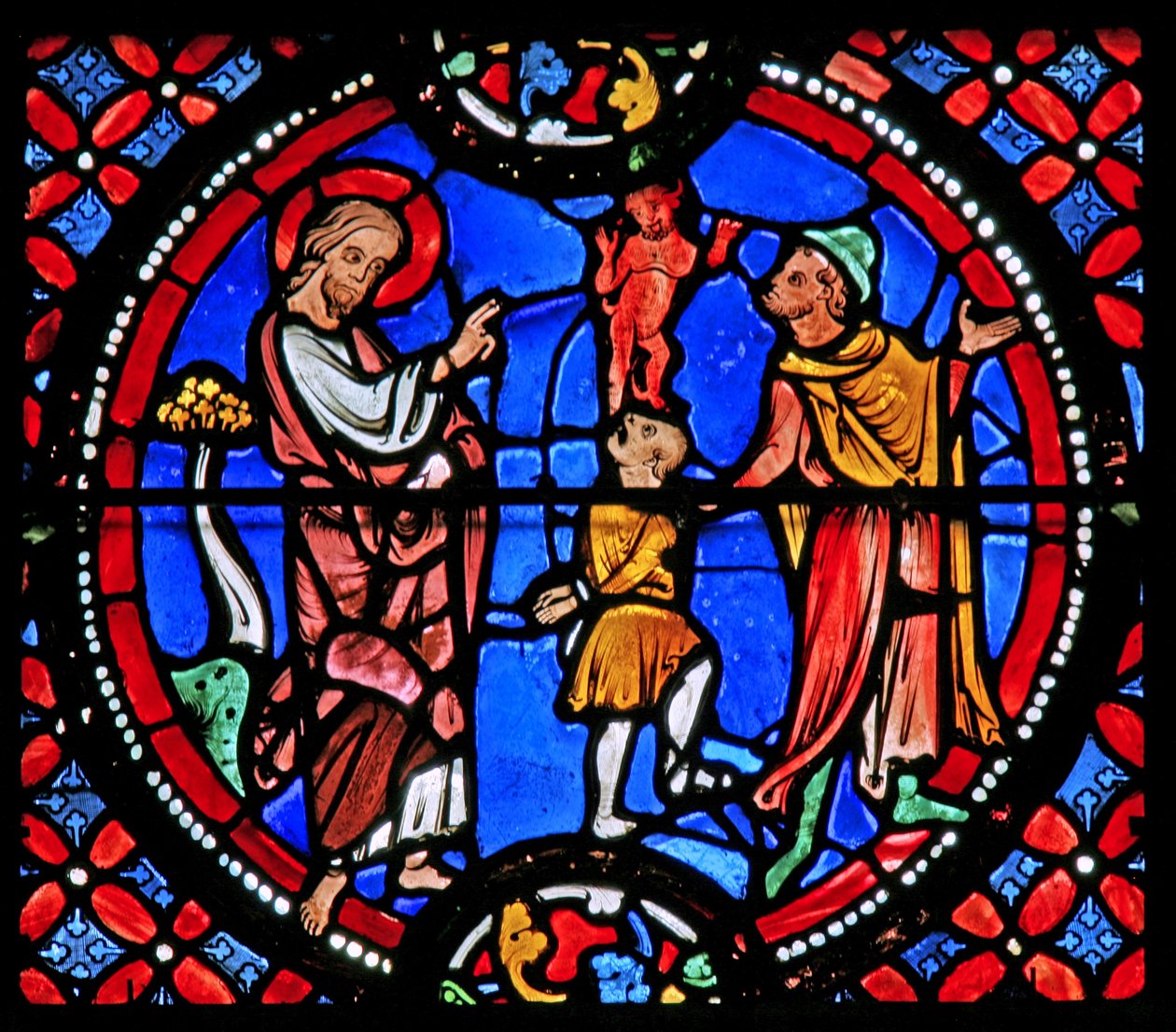 Window depicting St Andrew exorcising a demon