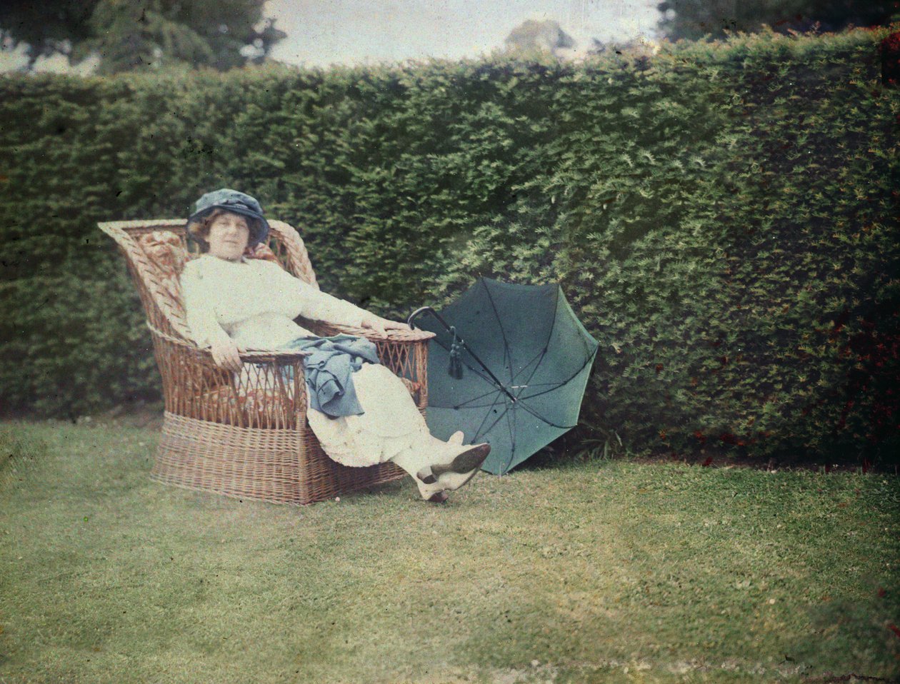 Woman sitting in a garden chair (autochrome) by George Bernard Shaw