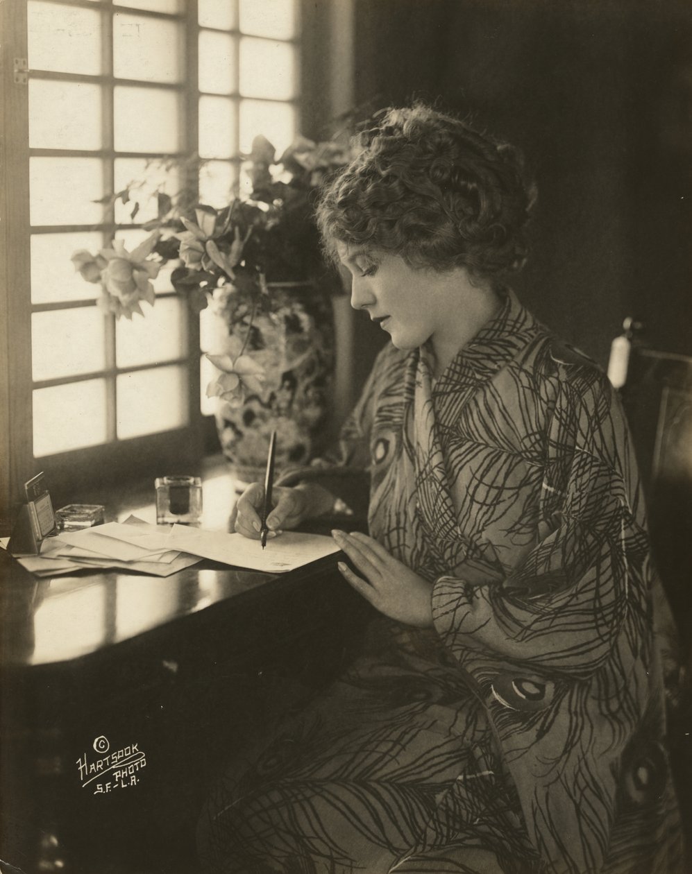 Mary Pickford, Wearing a Kimono, Writing at a Desk, c.1918 by Bartolome Esteban and studio Murillo