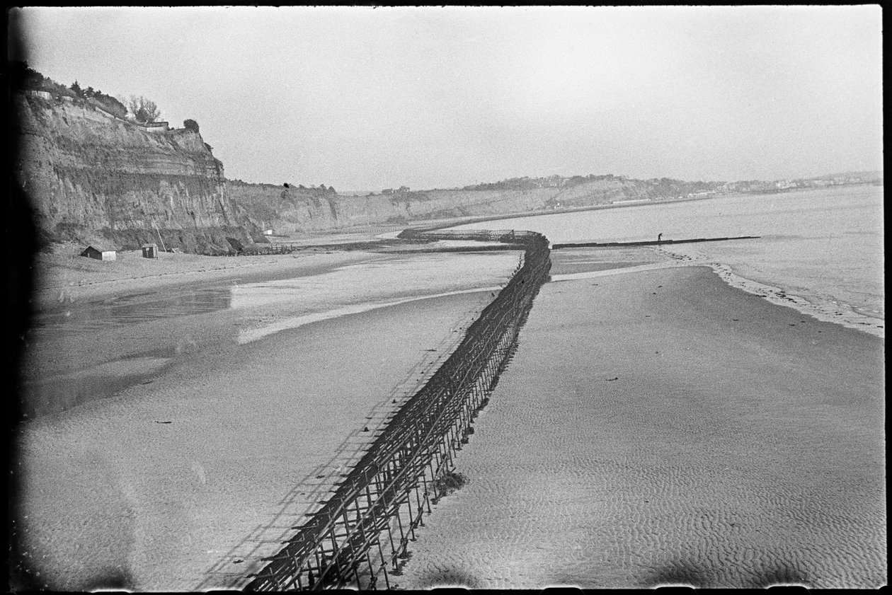 Shanklin Beach, showing Admiralty scaffolding along the coastline by George R. Long