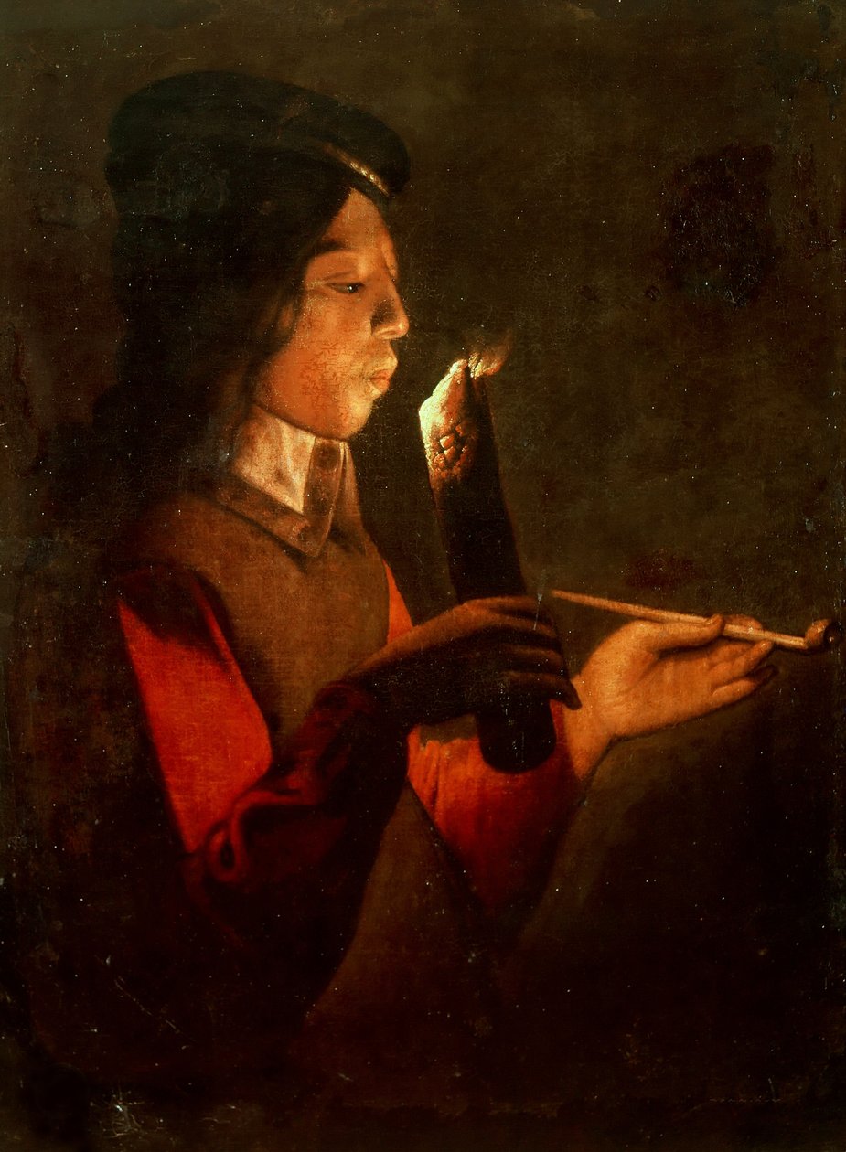 A Young Boy with a Pipe, Blowing on a Firebrand by Georges de, La Tour