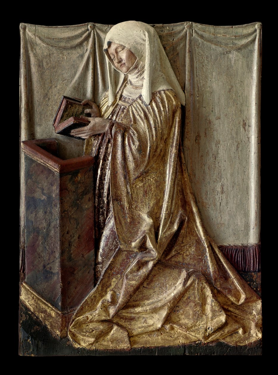 Kneeling donor Fragment of a carved altarpiece in polychrome wood. From Swabia. 1520 approx. Paris, Louvre Museum by German School