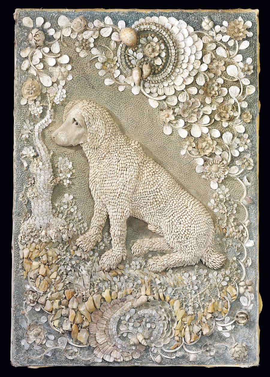 One of a pair of Louis XV seated dogs modelled in relief, within a grotto-like surround by German School