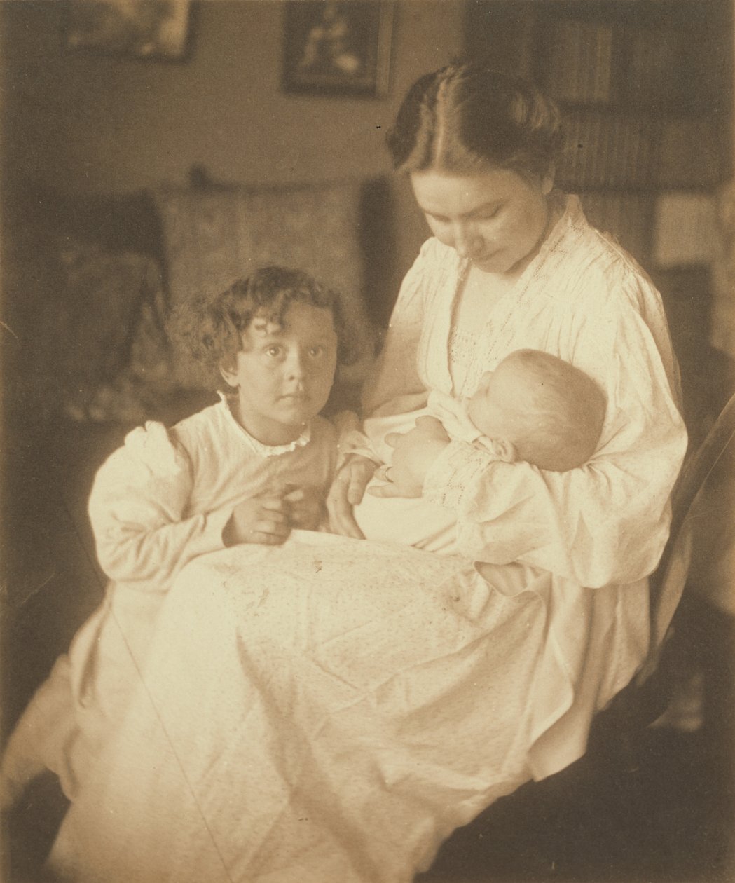 Mother in Dressing Gown, Seated, with Infant and Small Son by Gertrude Käsebier