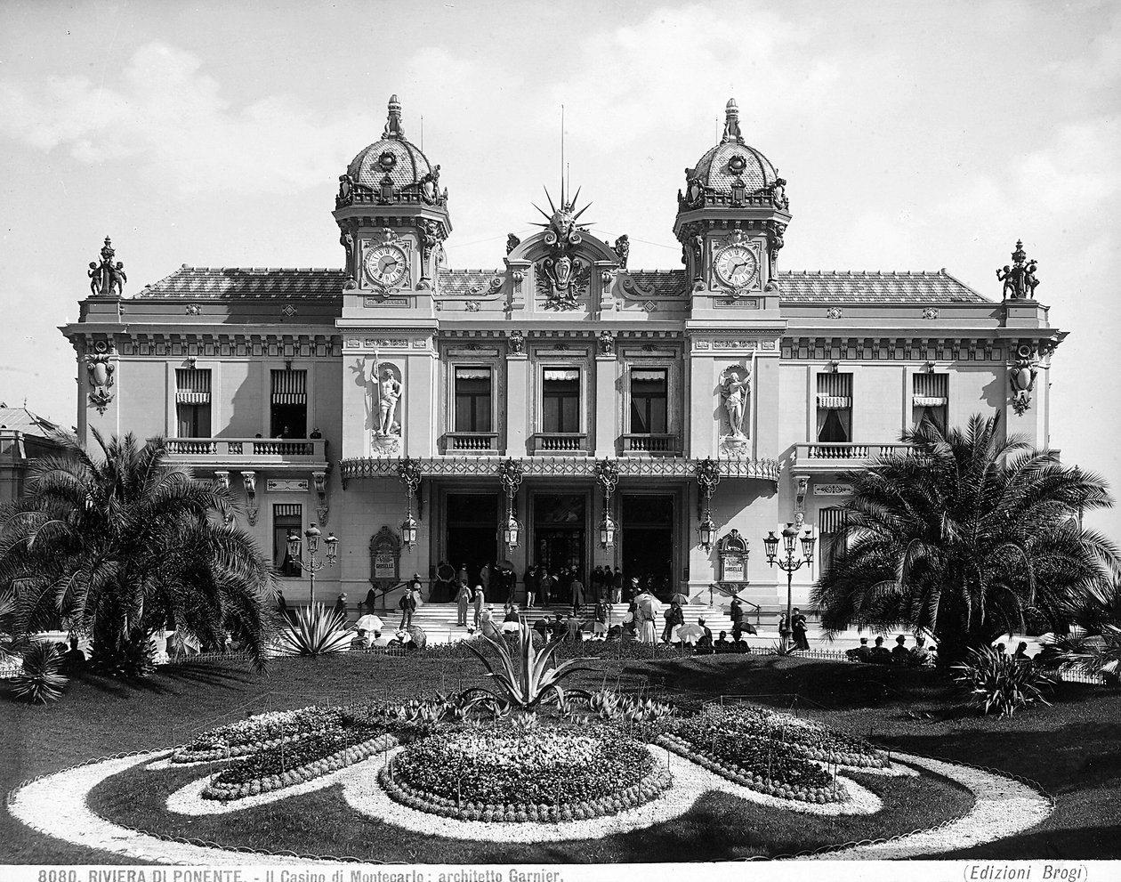 Facade of the Montecarlo Casino. A crowd of people animates the staircase at the entrance by Giacomo Brogi
