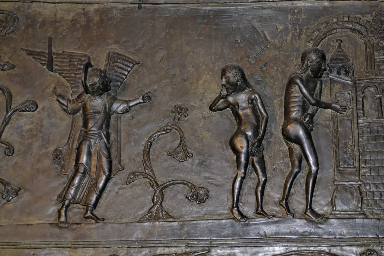 Ottonian Art: Adam and Eve expelled from Paradise. Around 1015. Sculpture on one of the bronze doors of the Cathedral Saint Mary in Hildesheim (Germany). by Phillipe de Marlier
