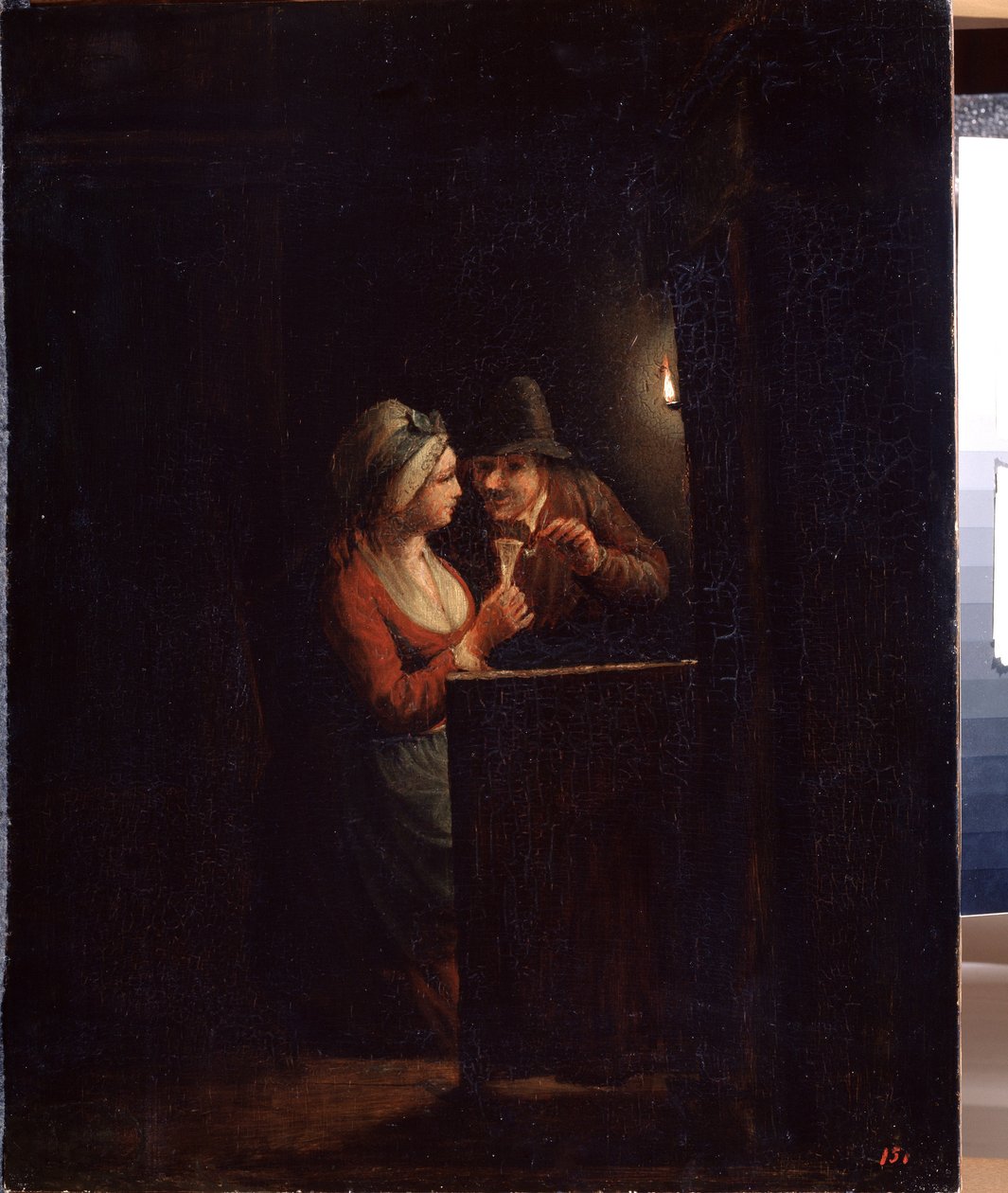 A Man and a Woman at Candlelight by Godfried Schalcken