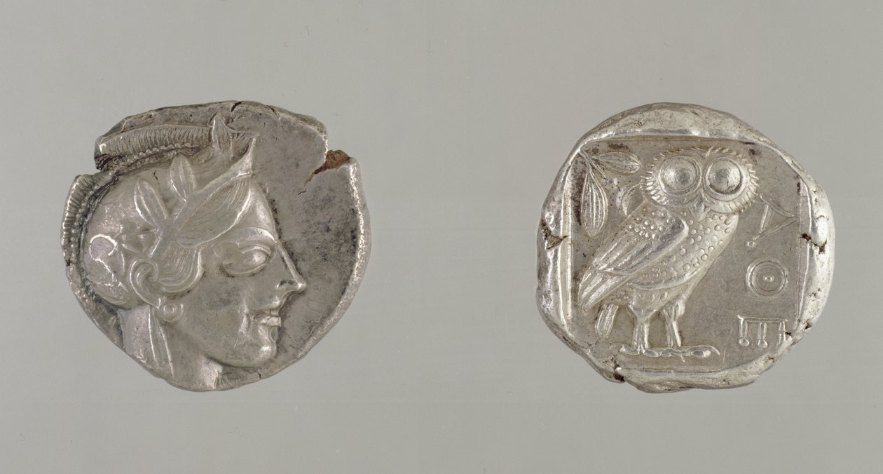 Both sides of a Drachma, featuring the head of Athena and an Owl, from Athens by Greek