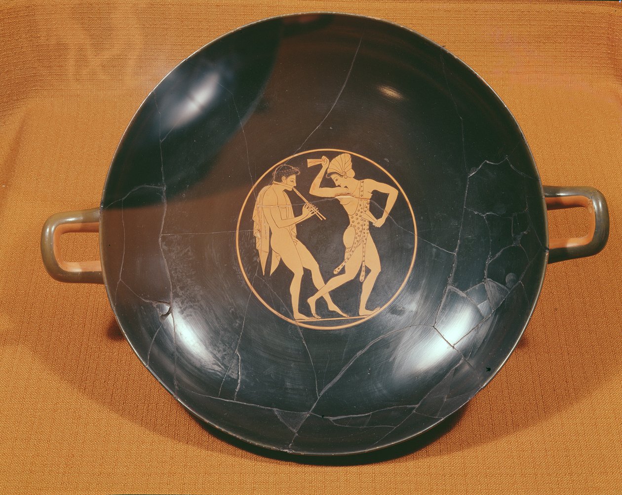 Kylix depicting a flute player and a dancer by Greek